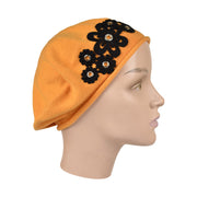 Beret with Floral Grommets