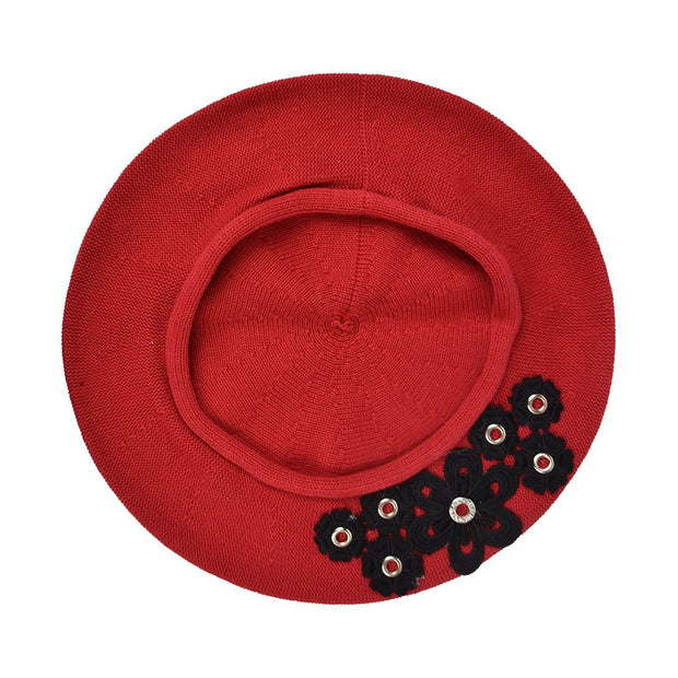 Beret with Floral Grommets